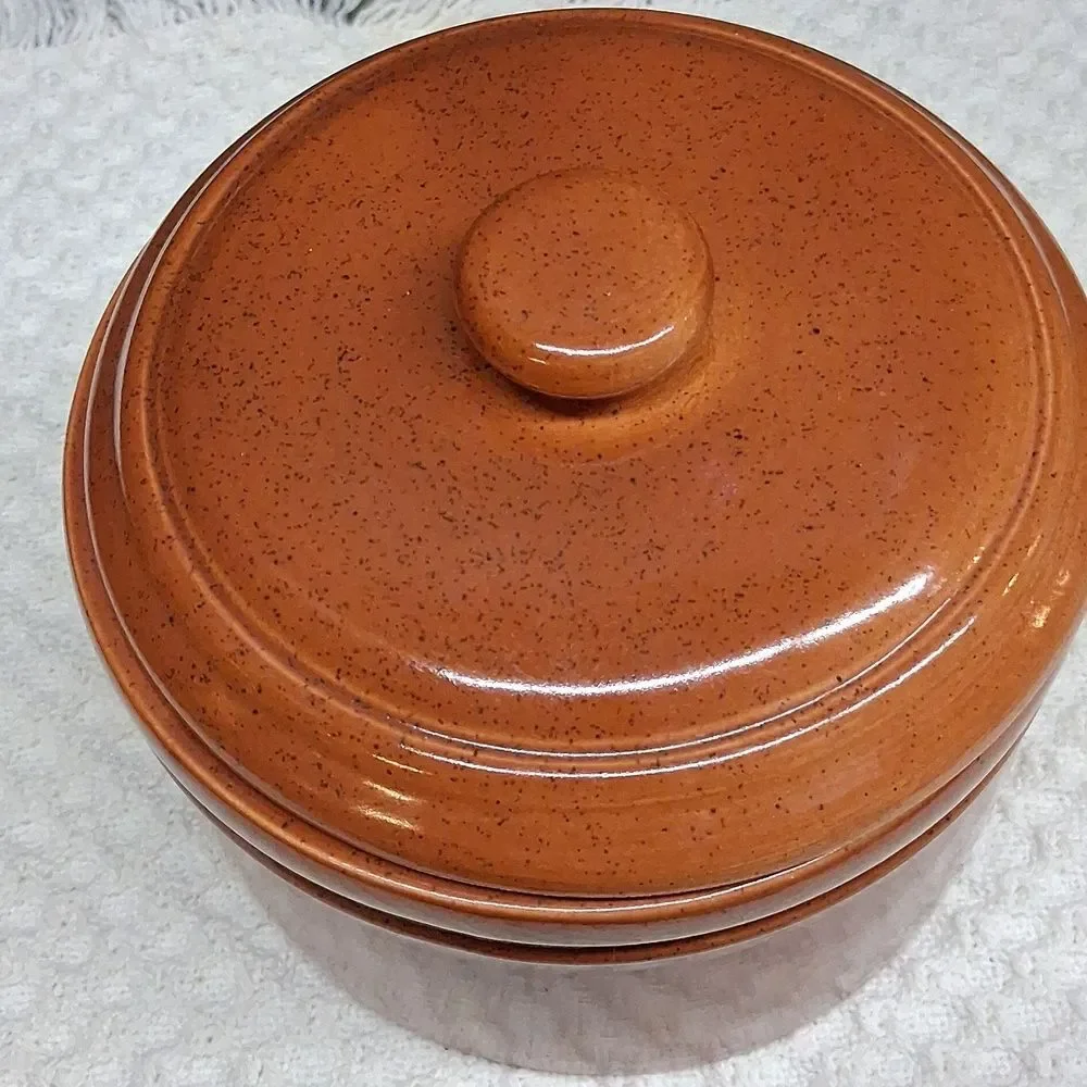 Vintage pottery crock bowl with lid with brown speckled glaze finish.